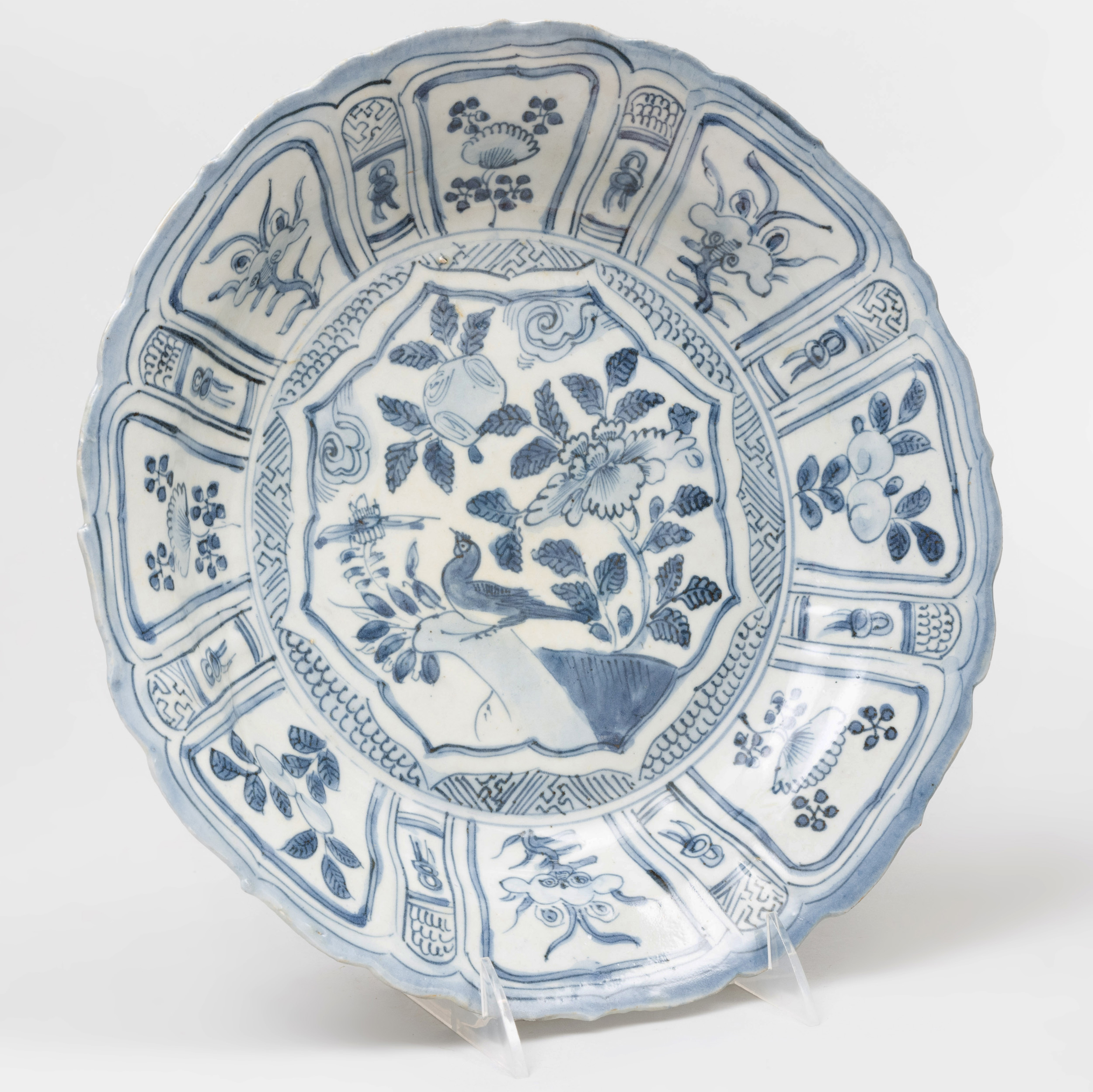 blue pottery with white figures