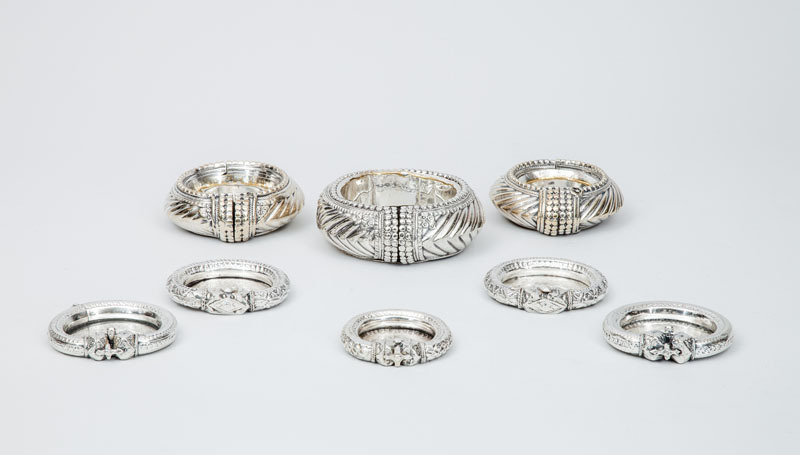 Eight North African Silver-Plated Bracelets Mounted as Dishes