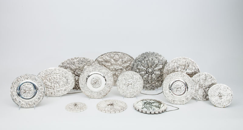 Fourteen Silver-Plated Mirror Backs
