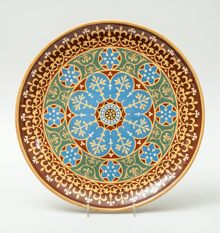 GOTHIC REVIVAL GLAZED POTTERY CHARGER, IN THE STYLE OF A.W.N. PUGIN, ENGLAND