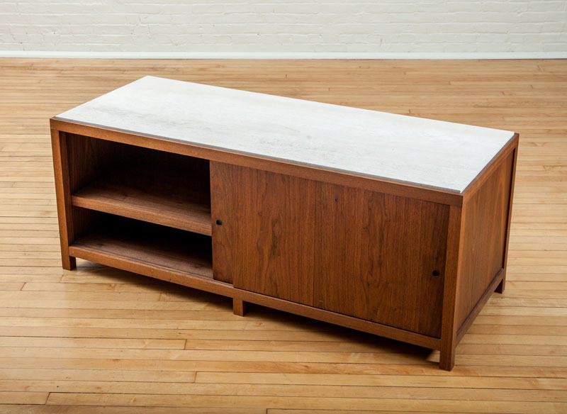 ALAN WANZENBERG DESIGN, TRAVERTINE-TOP WALNUT SLIDING-DOOR CABINET