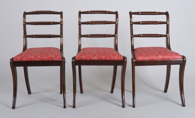 Three Regency Brass-Mounted and Carved Mahogany Side Chairs