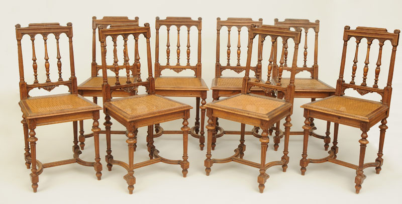 Set of Eight Late Victorian Carved Oak and Caned Side Chairs