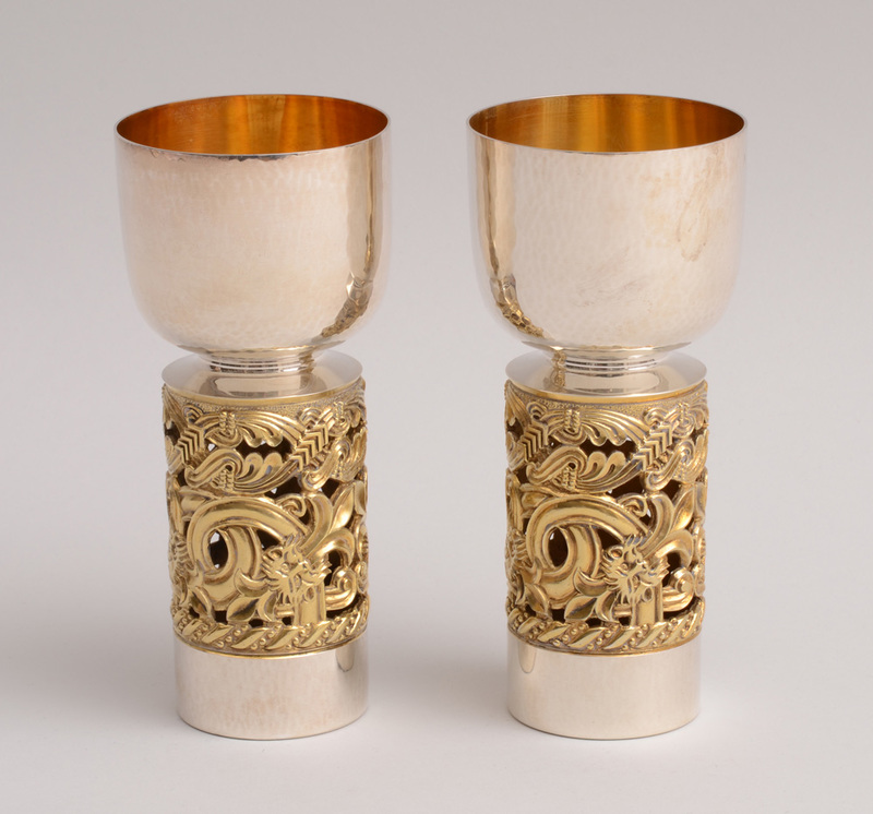 PAIR OF ENGLISH HAMMERED SILVER AND SILVER-GILT GOBLETS