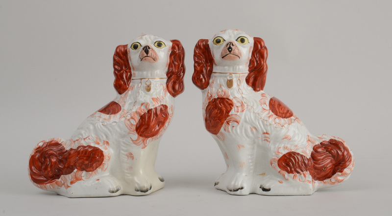 PAIR OF STAFFORDSHIRE MODELS OF SEATED SPANIELS