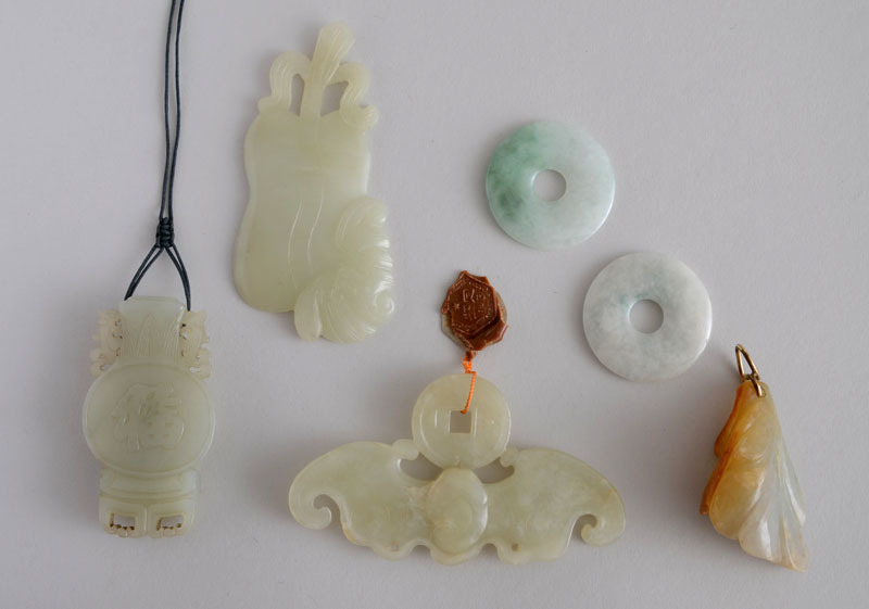 Six Carved Mutton Fat Jade Pendants