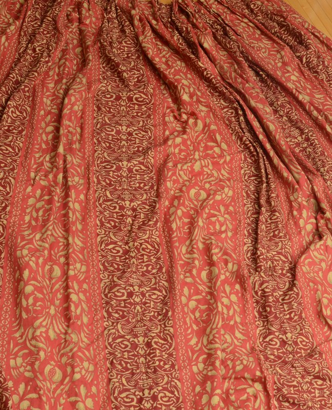 Two Red and Gold Damask Curtain Panels and Five Matching Fringed Valances