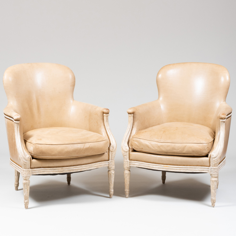 Pair of Louis XV/XVI Style Painted and Leather Upholstered Bergeres 