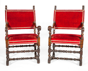 PAIR OF IBERIAN BAROQUE STYLE STAINED WALNUT HALL CHAIRS