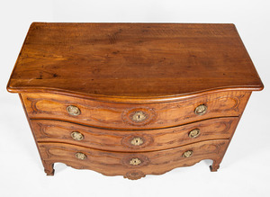 LOUIS XV PROVINCIAL ORMOLU-MOUNTED CARVED WALNUT COMMODE