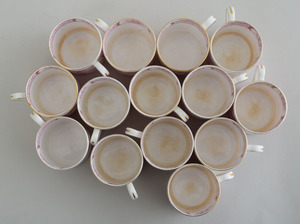 SET OF FOURTEEN TUSCAN PINK TRANSFER-PRINTED CHINA CYLINDRICAL DEMITASSE CUPS