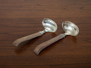 WILLIAM SPRATLING TWO SMALL STERLING SILVER AND WOOD LADLES