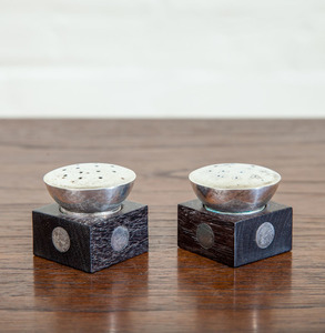 WILLIAM SPRATLING STERLING SILVER AND ROSEWOOD SALT AND PEPPER SHAKERS