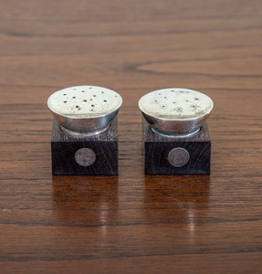 WILLIAM SPRATLING STERLING SILVER AND ROSEWOOD SALT AND PEPPER SHAKERS