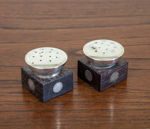 WILLIAM SPRATLING STERLING SILVER AND ROSEWOOD SALT AND PEPPER SHAKERS