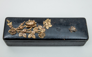 French Black Lacquer Glove Box with Gilt-Metal Rose Stem Mount and a Brass and Mother-of-Pearl Inlaid Burrwood Glove Box