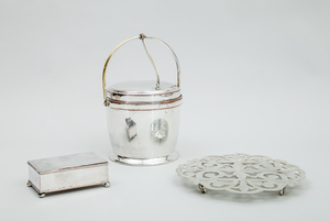 Silver-Plated Ice Bucket with Hinged Lid, a Plated Cigarette Box and an Adjustable Trivet
