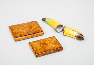 Two Continental Burrwood Card Cases and a Limoges Gilt-Metal-Mounted Porcelain Banana-Form Box