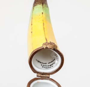 Two Continental Burrwood Card Cases and a Limoges Gilt-Metal-Mounted Porcelain Banana-Form Box