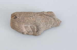 CARVED STONE MODEL OF A SEATED BULL, AFTER THE ANTIQUE