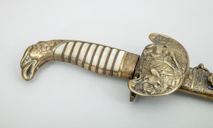GERMAN MOTHER-OF-PEARL AND BRASS EAGLE-HEADED SWORD AND SHEATH MADE FOR AMERICAN MARKET