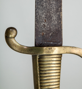 TWO SIMILAR FRENCH BRASS-HANDLED STEEL SABRES