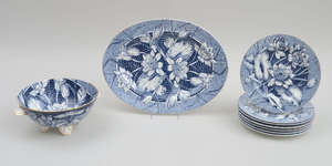 Set of Seven Wedgwood Aesthetic Movement Dinner Plates with Lotus Blooms, and a Matching Fruit Bowl and Oval Platter