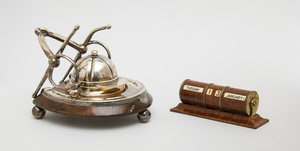 ENGLISH SILVER-PLATED AND OAK INKSTAND AND AN ALLIGATOR-CLAD PERPETUAL CALENDAR