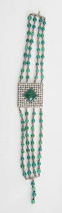 Two Gilt-Metal and Paste Chokers and a Gilt-Metal, Paste and Simulated Emerald Choker