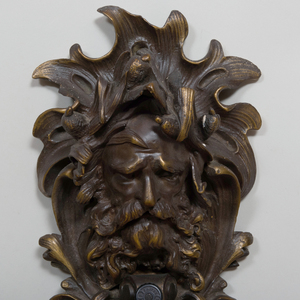 Pair of Rococo Style Bronze Figural Single-Light Wall Sconces
