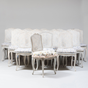 Twenty-Two Louis XV Style Painted Wood and Caned Side Chairs, Stamped Jean Mocqué à Paris, of Recent Manufacture