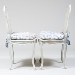 Twenty-Two Louis XV Style Painted Wood and Caned Side Chairs, Stamped Jean Mocqué à Paris, of Recent Manufacture