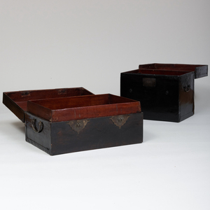 Two Chinese Metal-Mounted Black Lacquer Pigskin Trunks