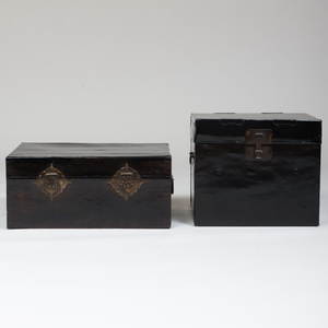 Two Chinese Metal-Mounted Black Lacquer Pigskin Trunks