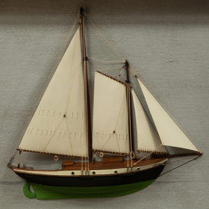 Two Half Hull Models of Sailboats
