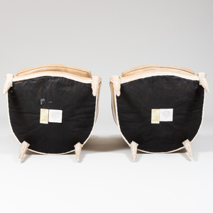Pair of Louis XV/XVI Style Painted and Leather Upholstered Bergeres 