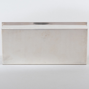 Tiffany & Co. Silver Cigarette Box, a Black, Starr & Frost Cigarette Box, and a George V Cigarette Box 
