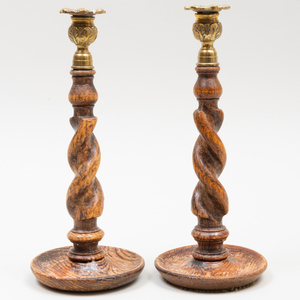 Two Pairs of Brass-Mounted English Oak and Elm Candlesticks