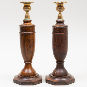 Two Pairs of Brass-Mounted English Oak and Elm Candlesticks