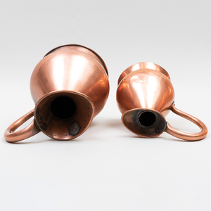 Group of Nine Copper Pitchers, Most English