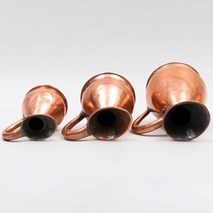 Group of Nine Copper Pitchers, Most English